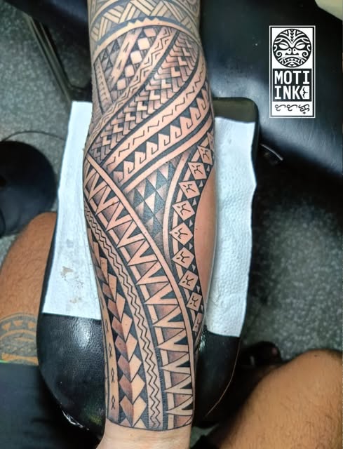 Filipino tribal lower-leg bands with baybayin-style glyphs